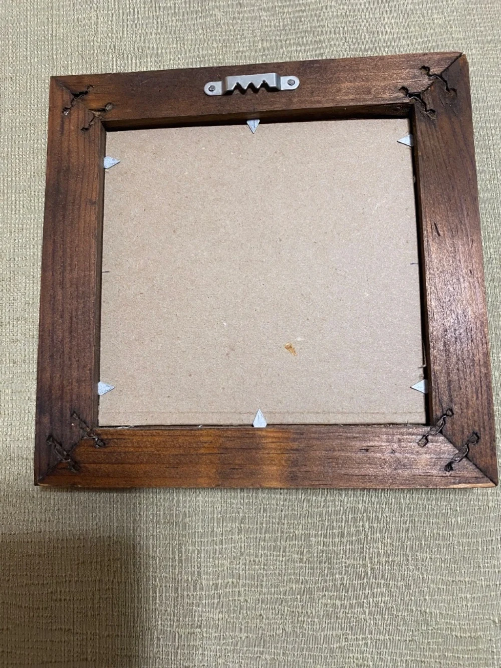 Cardinal framed 7X7 inch cross stitched.